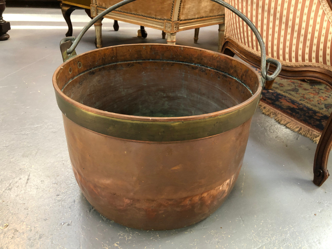 French Antique Copper pot with a lovely brass band and has a handle in good original condition.