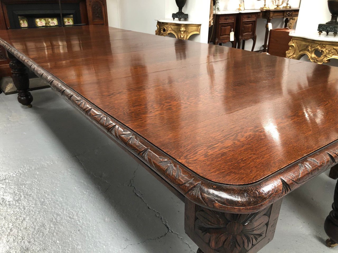 Lovely Antique Tudor Style oak extension table with 3 leaves in good detailed condition.