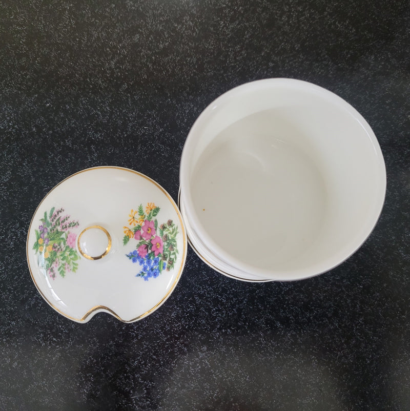 Fortnum & Mason Piccadilly London England floral decorated covered honey/jam pot. It is in good original condition with no chips or cracks, please view photos as they help form part of the description.