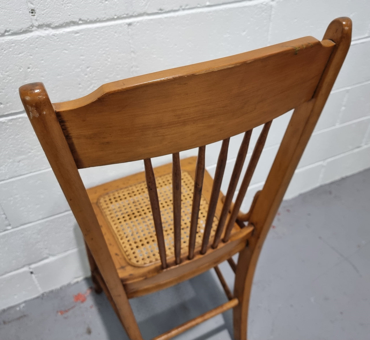 Australian Emu chair with cane inset seat. In good original condition.