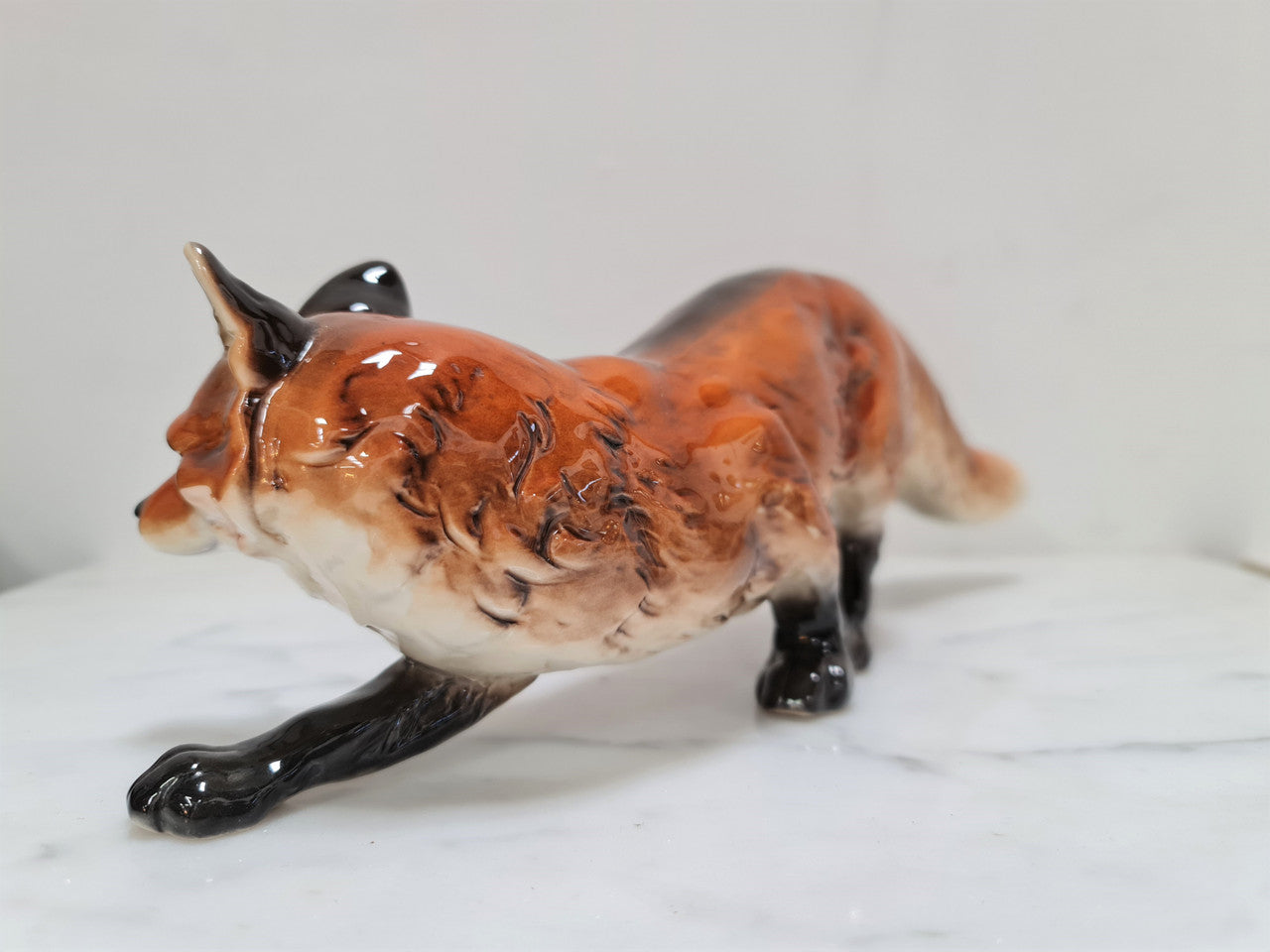 Beautifully sculptured and colored vintage Goebel Hummel fox figurine. Marked to base Goebel W Germany and numbered on leg 014. In great original condition.