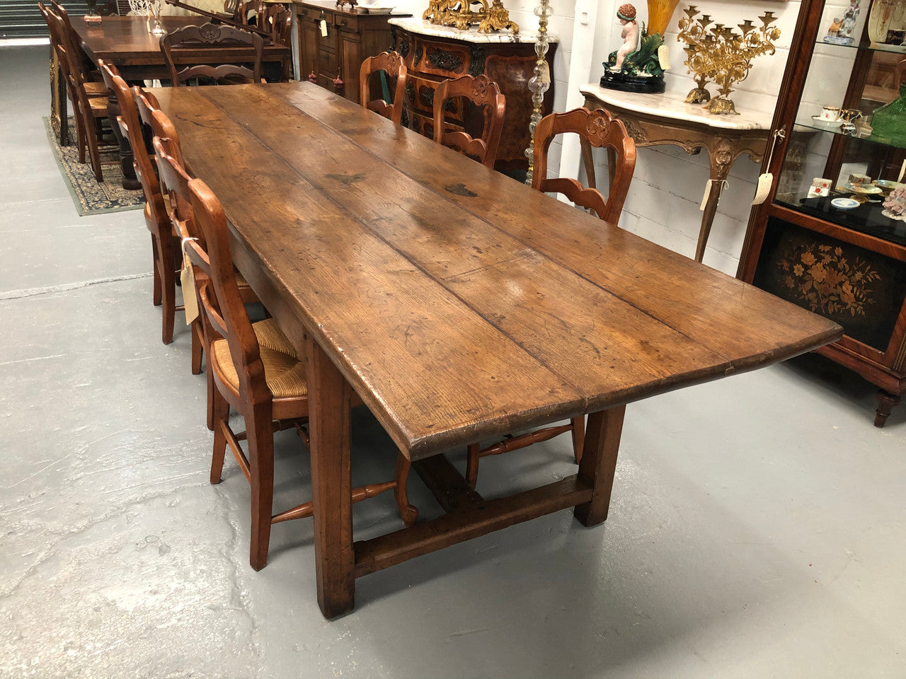 19th Century French three meter Farmhouse table with a beautiful original rustic top. In very good original detailed condition.