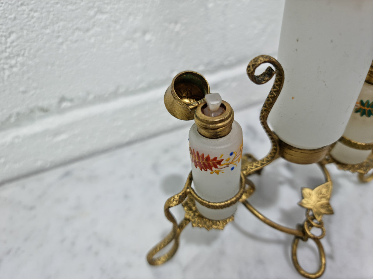 French 19th century perfume set in a gilt metal stand. Opaline glass beautifully hand painted and is in good original condition, please view photos as they help form part of the description.