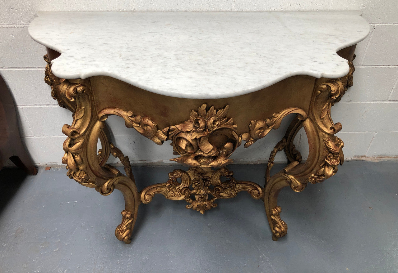 A very grand 19th century French marble top giltwood console. In very good original condition. Circa 1880.