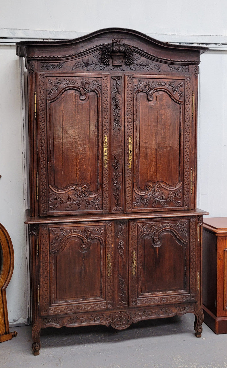 French Oak 18th Century superbly carved sideboard buffet. This amazing buffet has loads of character which is expected being circa 1790's. The top section has two fixed shelves and the bottom section has one fixed shelf. It has been sourced from France and is in good original detailed condition.