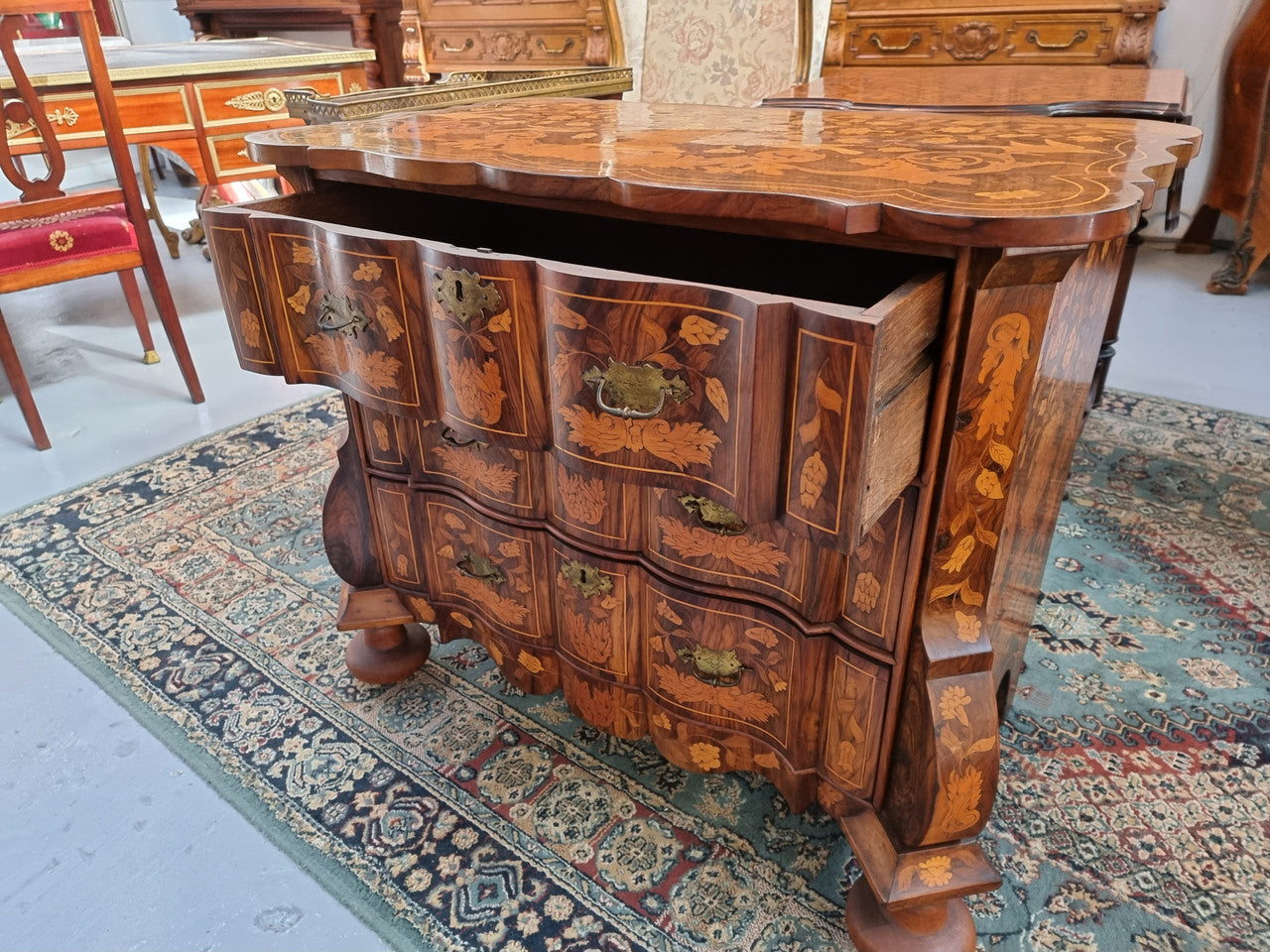 Very Fine highly decorative 18th century Dutch 3 drawer commode. It retains its original brass hardware and Escutcheons. In very good original detailed condition.