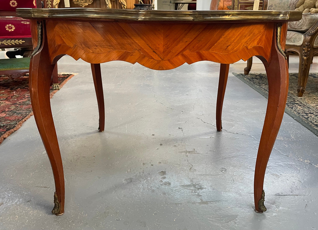 French Louis XV style marquetry inlaid marble top coffee table. In good original detailed condition.