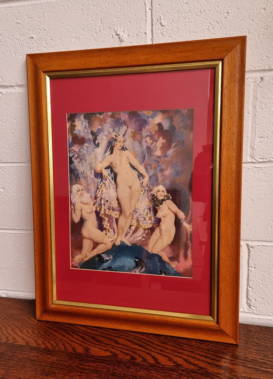 A beautiful framed coloured print After Norman Lindsay, of three female nudes in good condition.