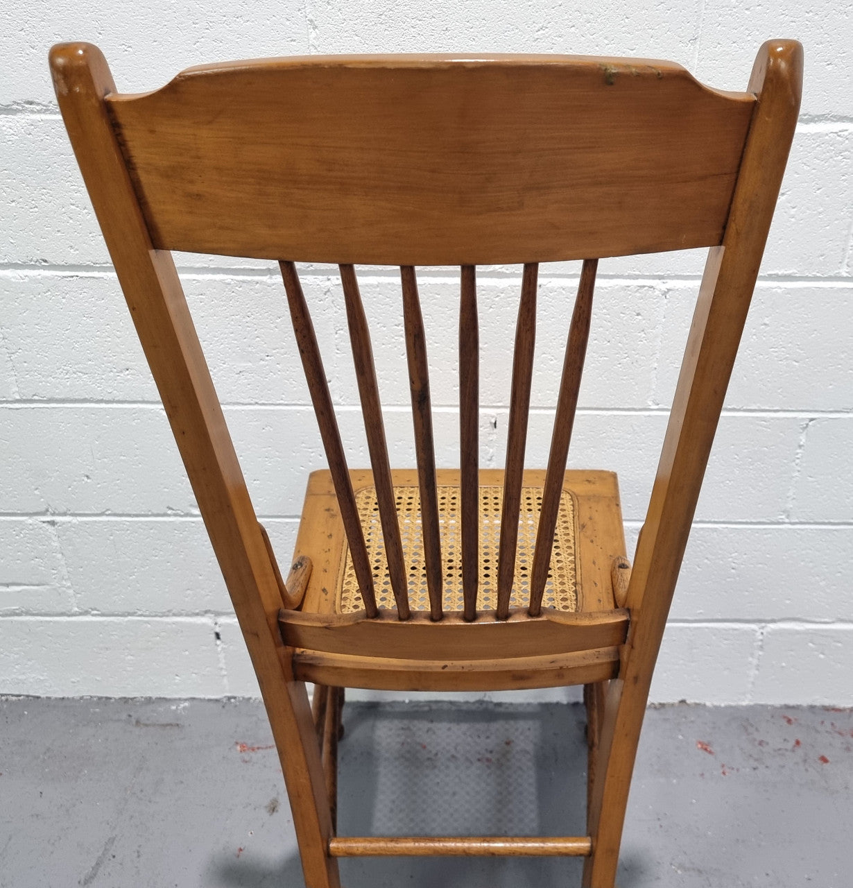 Australian Emu chair with cane inset seat. In good original condition.