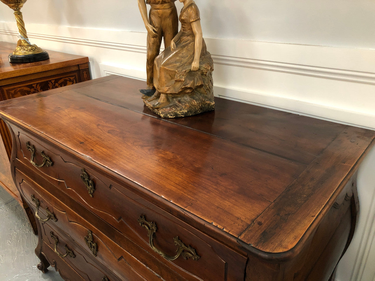 Beautiful 18th Century French all Cherrywood three drawer commode with beautiful ormolu mounts and handles. It is in good original detailed condition.