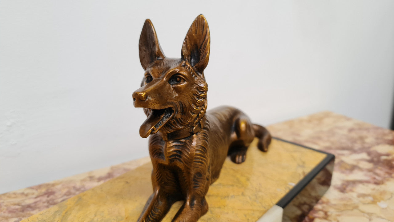 Art Deco sculpture of lovely seated lady with German Shepherd signed by signed by H.Molins. In good original detailed condition.