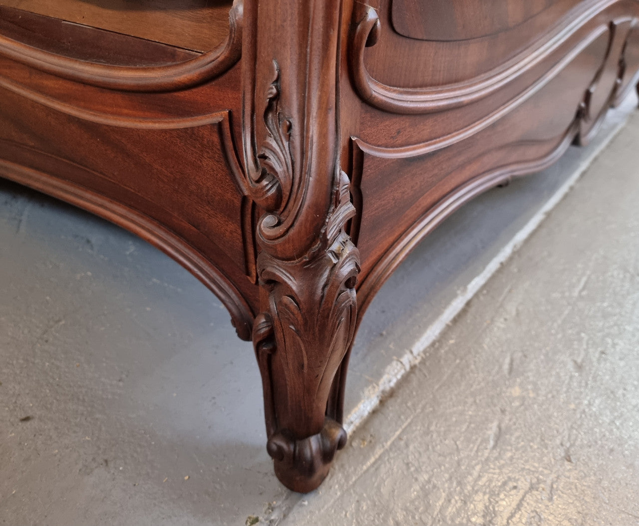 Beautiful French Walnut Louis XV style queen size bed with carving on the feet and in good original detailed condition.