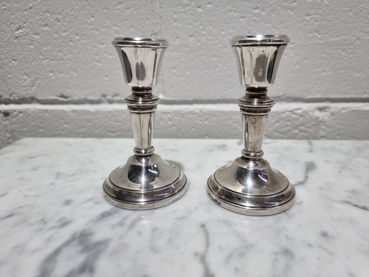 Pair of Birmingham sterling silver candlesticks date marks 1967. In good original condition, please view photos as they help form part of the description.