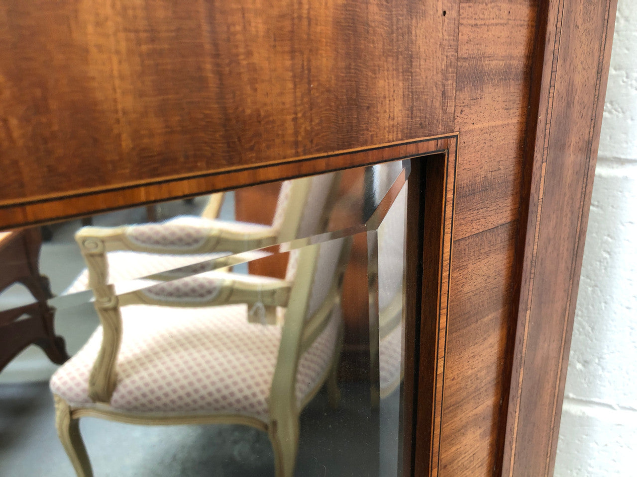 Beautiful Amboyna and Walnut Trumeau mirror. Has lovely parquetry inlay and is in good original condition.