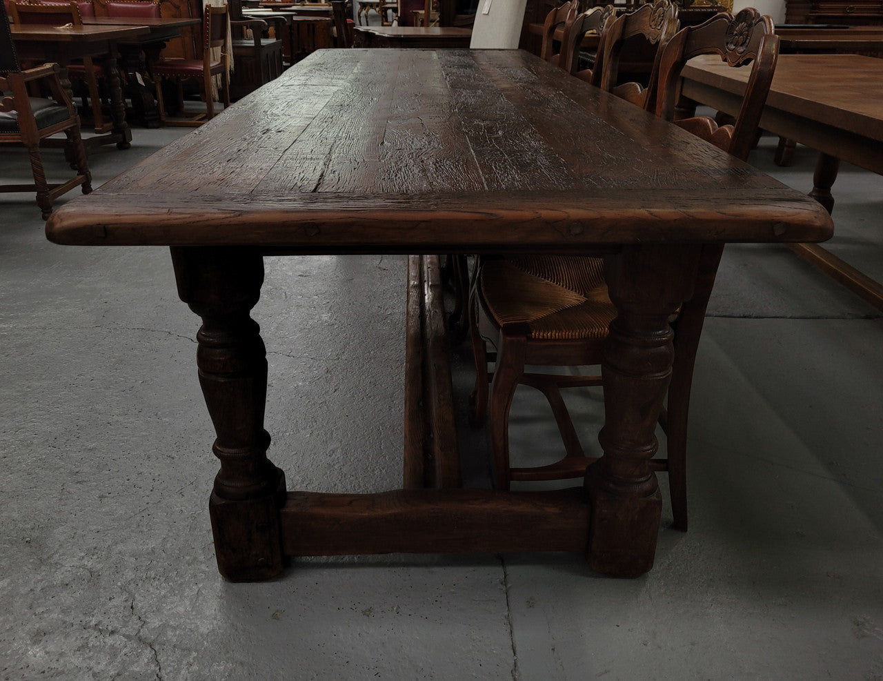 Amazing 2.65 meter French Elm Refectory dining table with loads of rustic charm. This table has been sourced from France and can comfortably seat ten people. It is in good original detailed condition.
