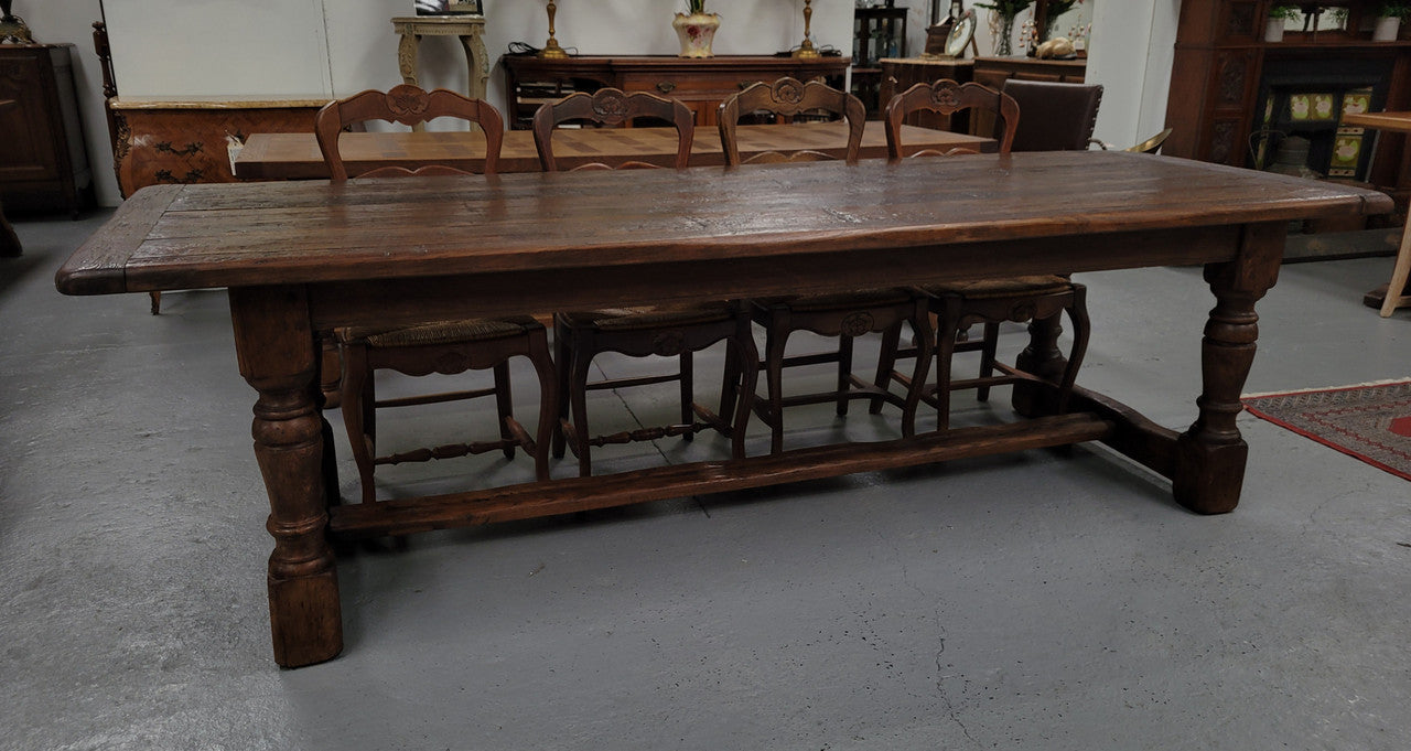 Amazing 2.65 meter French Elm Refectory dining table with loads of rustic charm. This table has been sourced from France and can comfortably seat ten people. It is in good original detailed condition.
