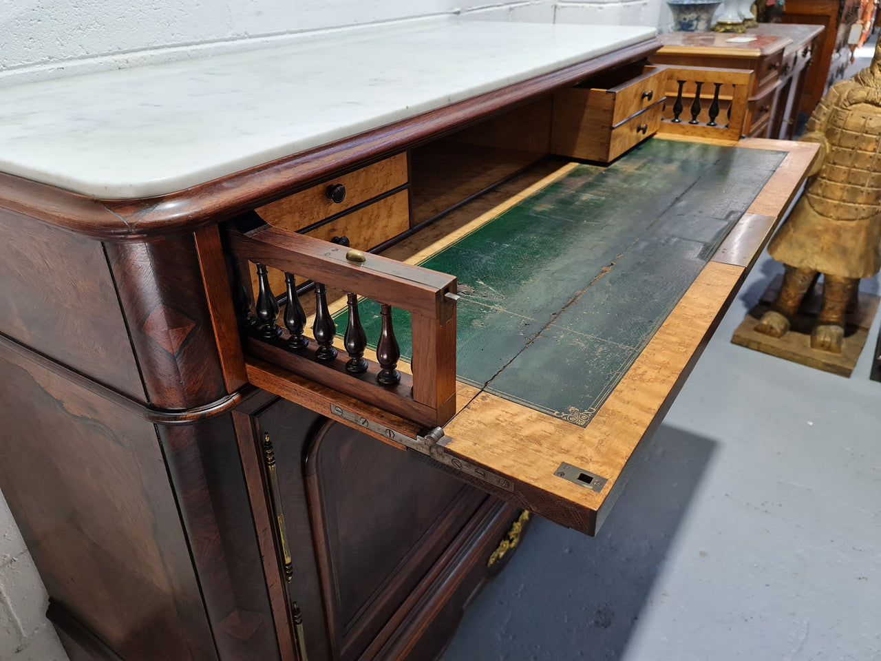 Stunning Rosewood Marble Topped Secretaire with two cupboards. Cupboards open to three fitted drawers and an additional secret drawer beneath the cupboard. All sitting on lovely carved legs and decorated with ormolu mounts. Circa: 1860. In good original detailed condition.