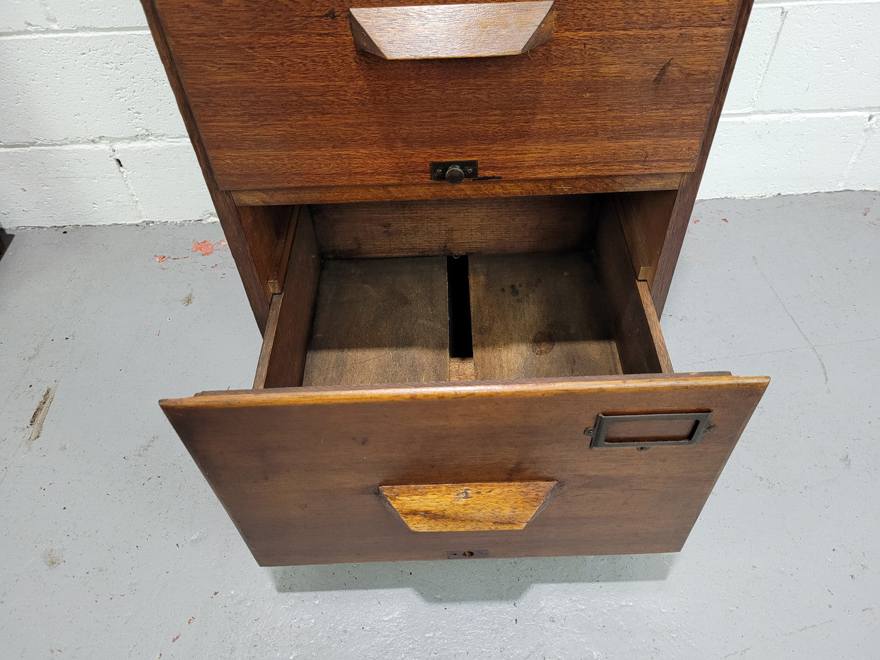 Blackwood four drawer filing cabinet in good original detailed condition.