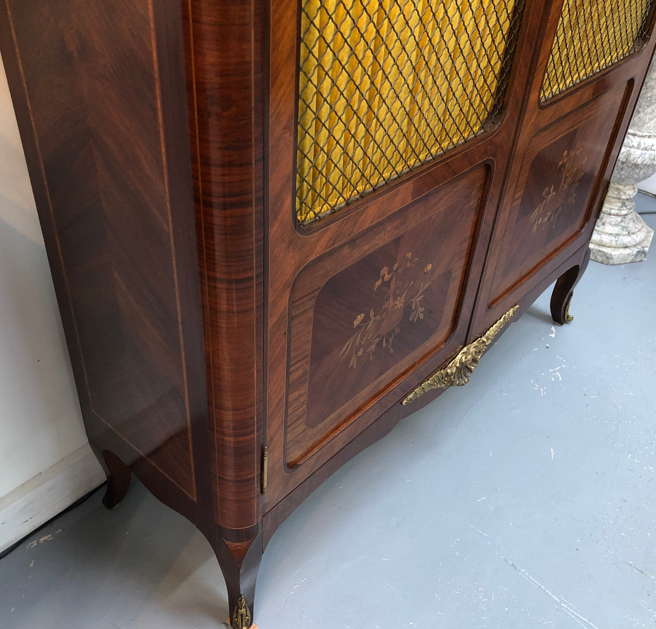 Beautiful 19th Century French Louis XV style Mahogany Blind Bookcase. This piece has lovely inlaid doors and ormolu mounts, marble top and four adjustable shelves. In good original detailed condition.