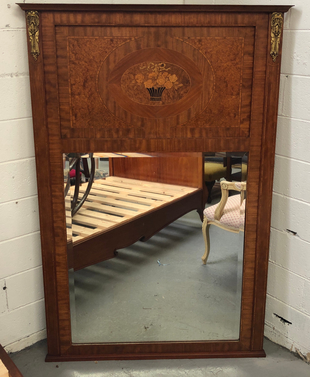 Beautiful Amboyna and Walnut Trumeau mirror. Has lovely parquetry inlay and is in good original condition.