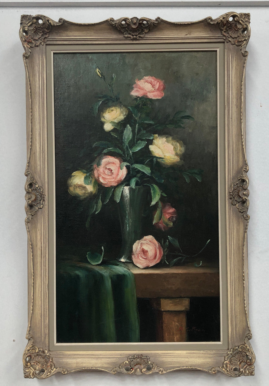 Charming oil painting of roses, signed and beautifully framed. In good original condition.