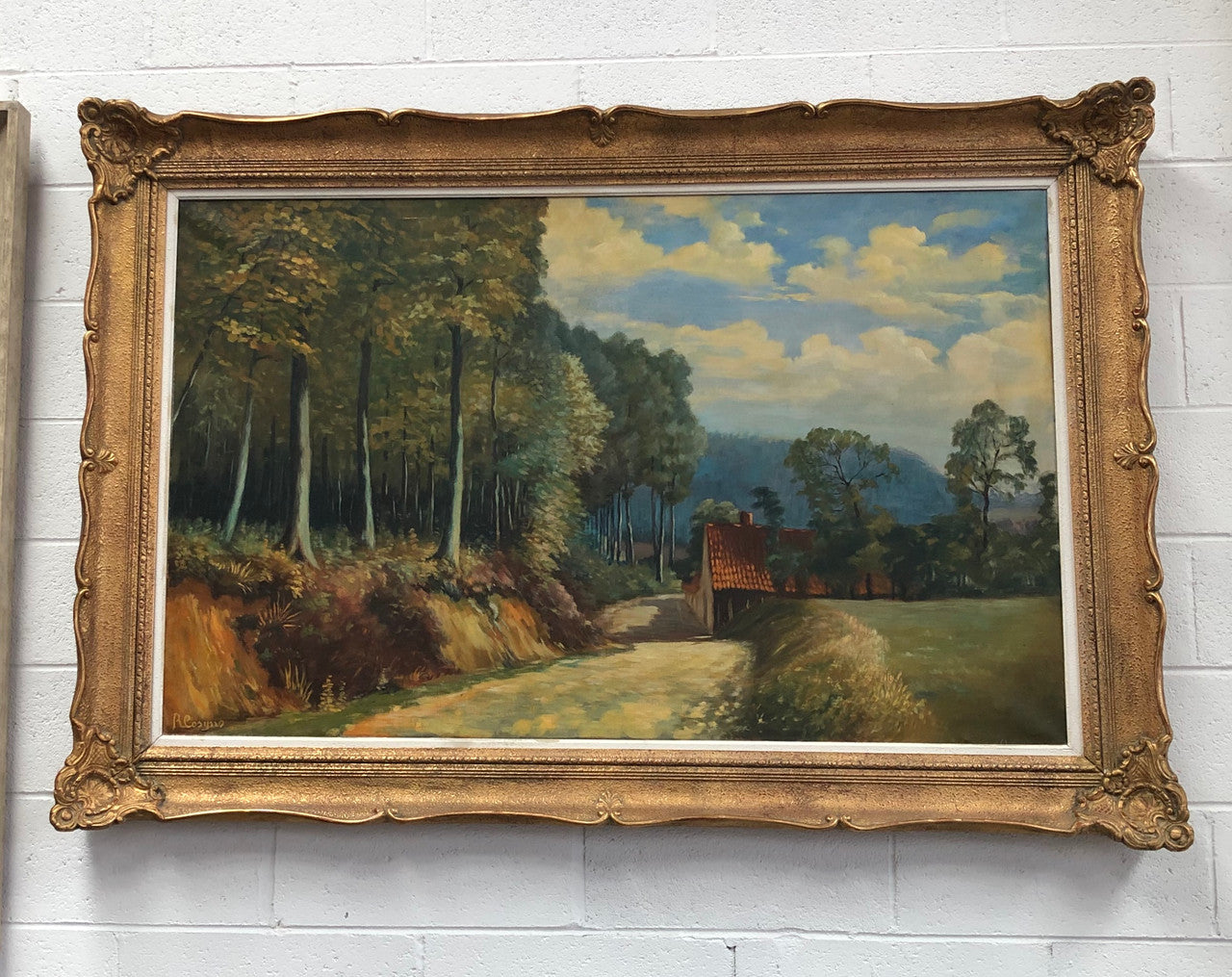 Large French oil on canvas of "country cottage" scene in a beautiful ornate gilt frame. In good original detailed condition.