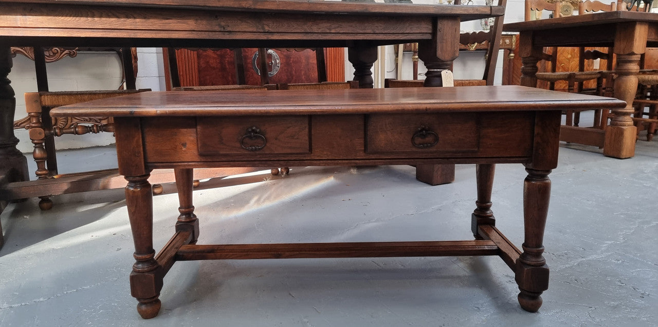 Beautiful French oak 2 drawer coffee table. In good original detailed condition.