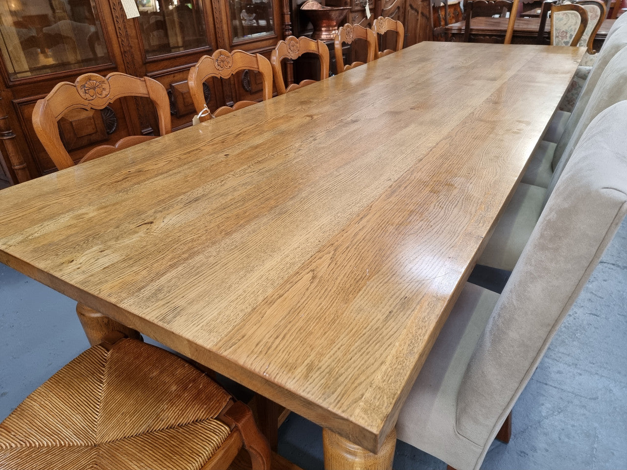 Stunning three meter Bespoke English Oak stretcher base farmhouse dining table. Can easily sit 10-12 people and is in very good original detailed condition.