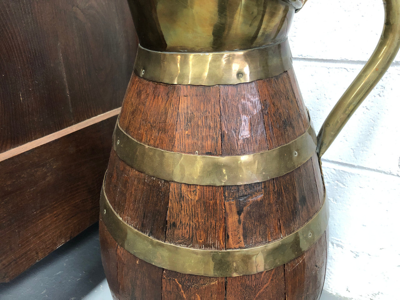 French Oak with Copper large wine jug. In good original detailed condition.