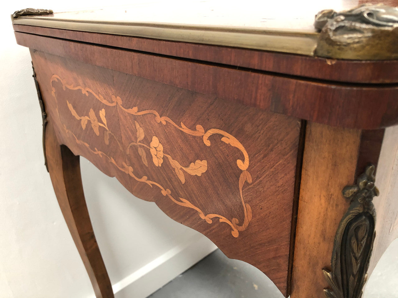 Beautiful french inlaid games table which includes internal drawers and bronze mounts. Internal drawers have counters and cards included.