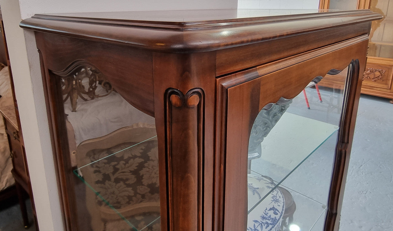 Petite French Louis XV style Walnut display cabinet with two glass shelves that can be adjusted and added storage at the bottom . In very good original detailed condition.