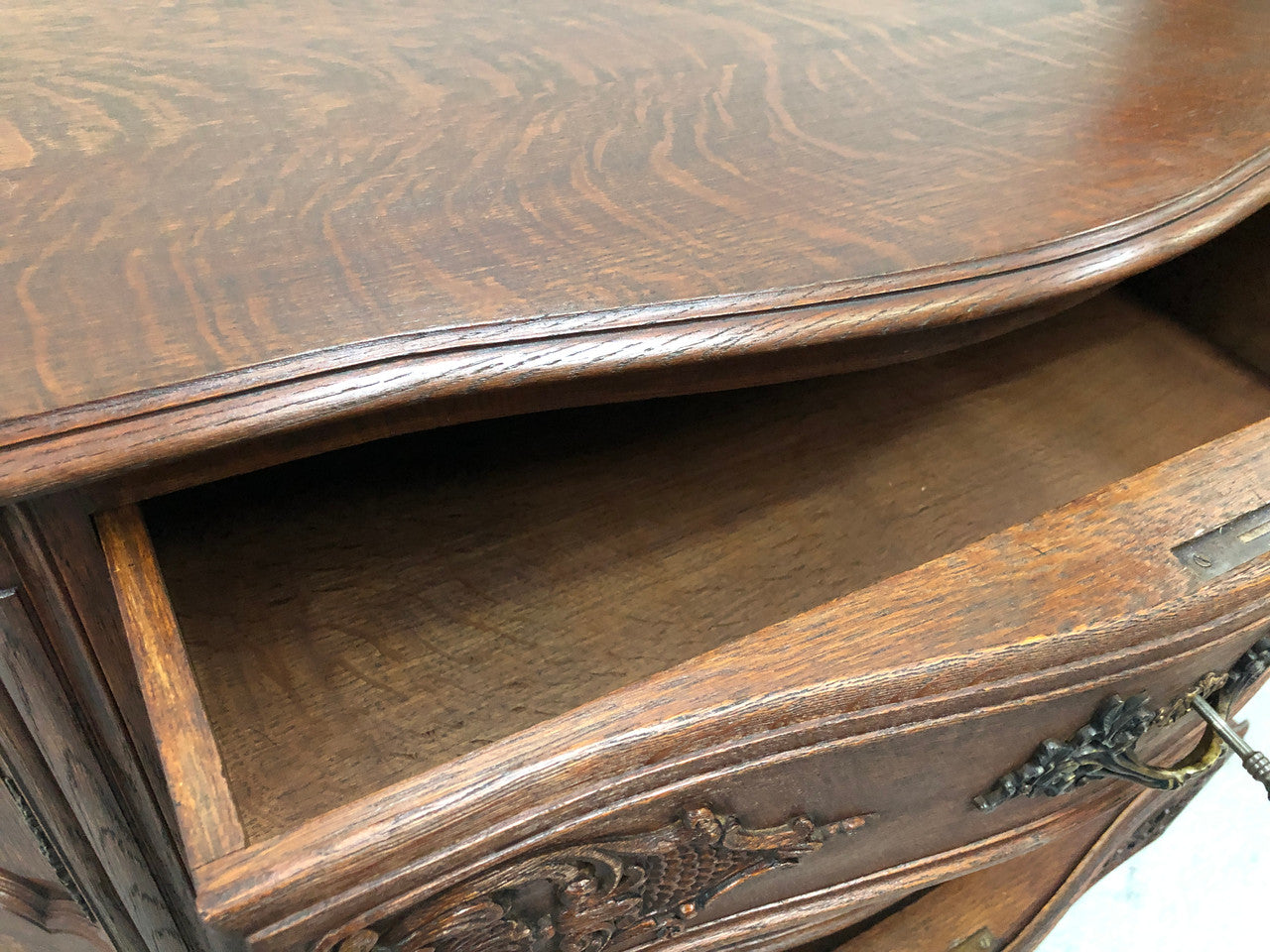 French Louis XV style dark Oak carved, two door and three drawer Commode /side cabinet. Could also be used as a TV cabinet or in the bedroom as storage very versatile. In good original detailed condition.