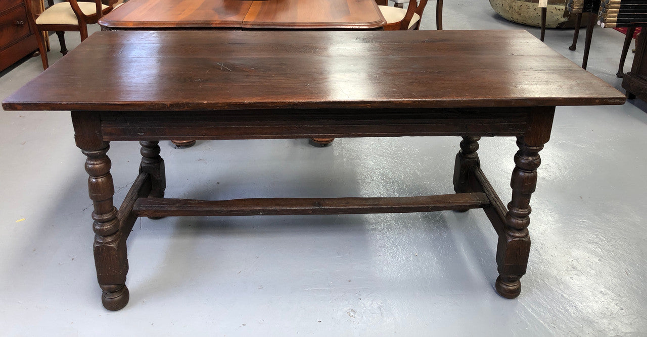 Early 19th Century French Oak petite size dining table. It seats six comfortably and would be ideal for an area with limited space. In very good original detailed condition.