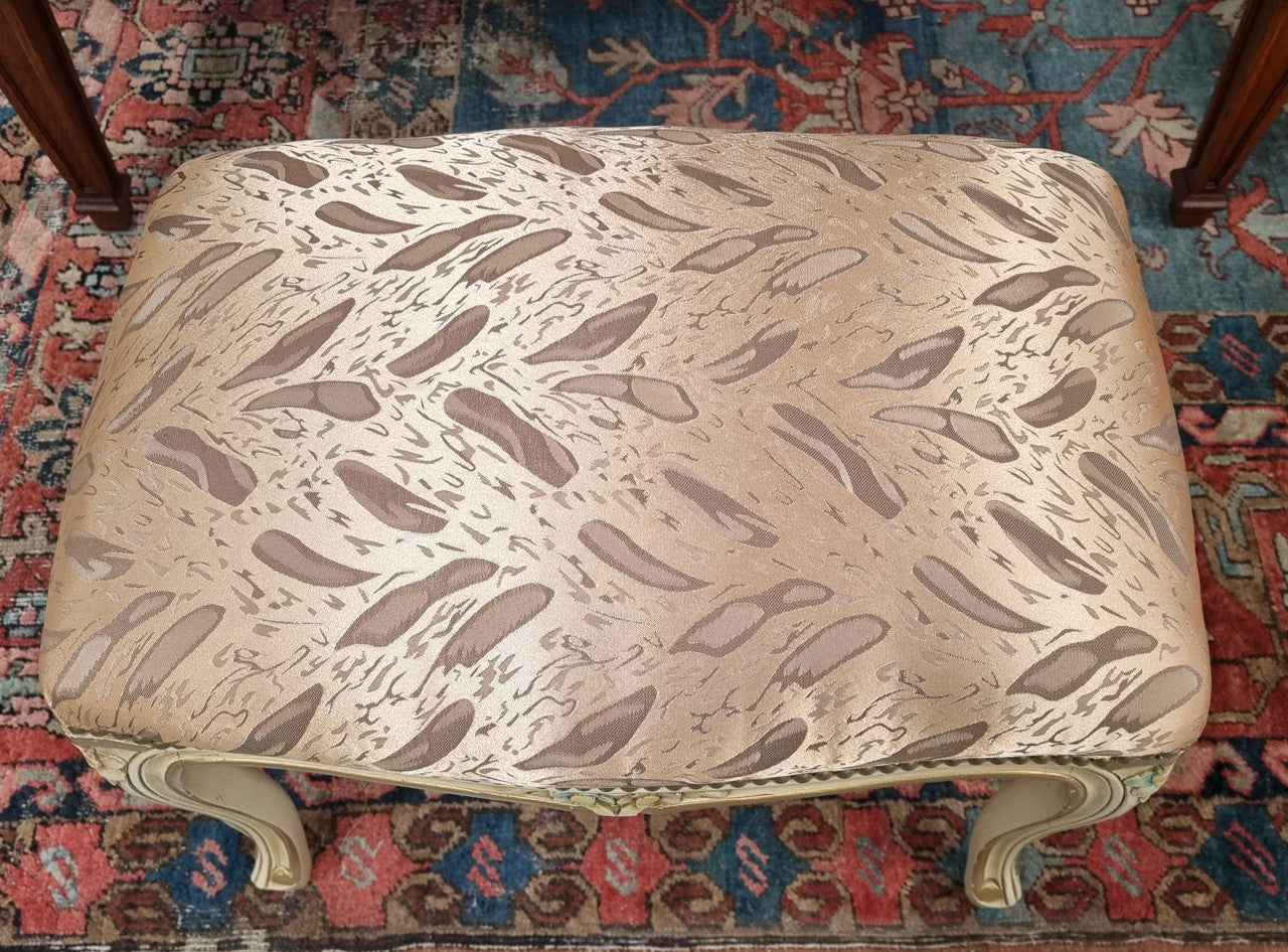 Appealing French Louis 15th style hand painted and gilded stool with good upholstery. In good original detailed condition.