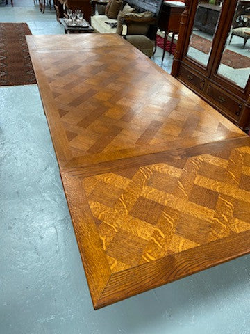 French Oak Renaissance style extension table. Extension leafs pull out either side and each leaf measures 54 cm. This allows you to use the table at three different sizes depending on your needs.