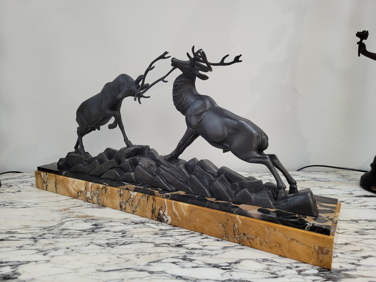 French Art Deco bronzed spelter and marble"Fighting Stags" statue by renowned artist and sculptor "Irenee Rochard".