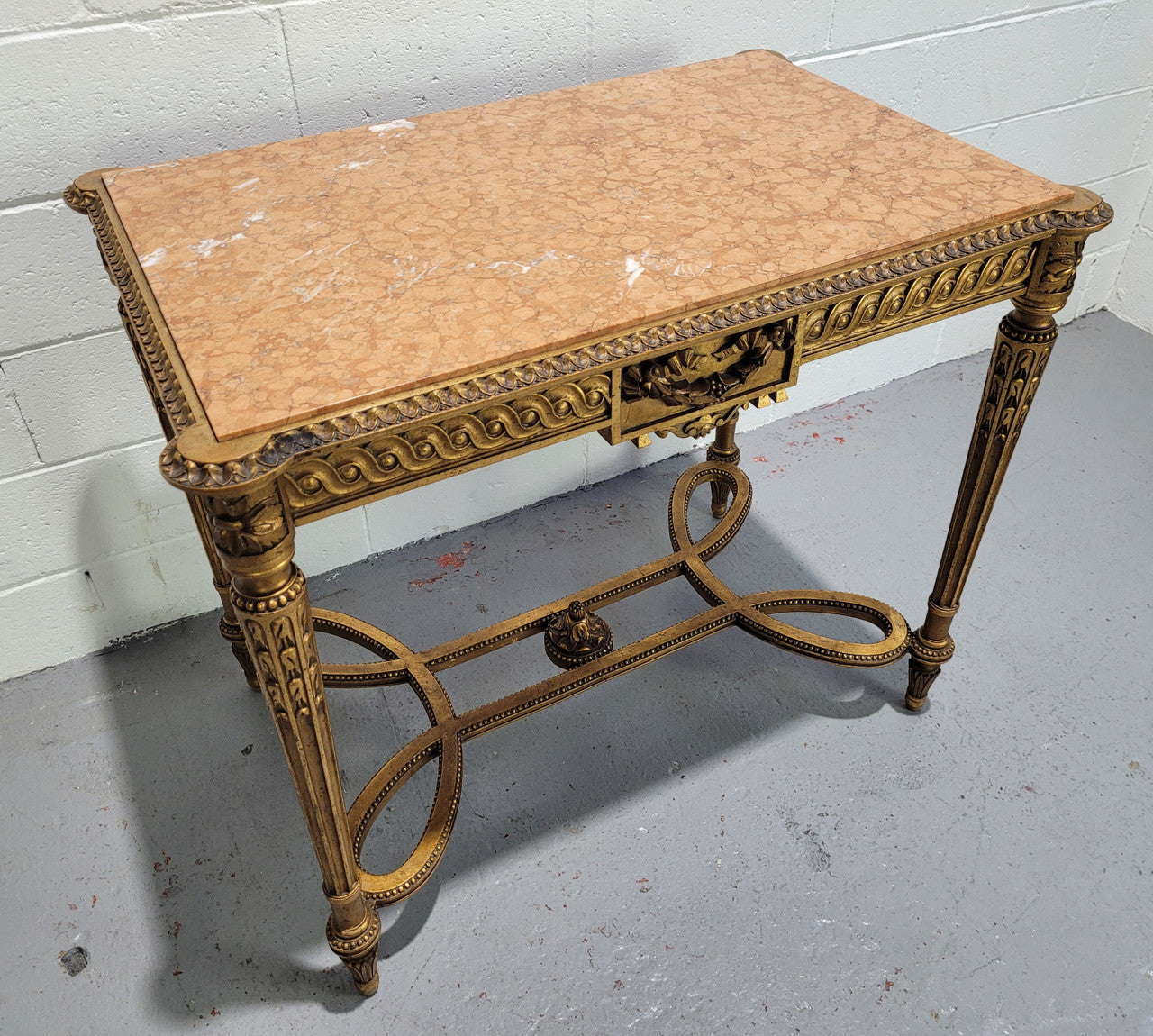Antique French Louis XVI style gilt center table with a stunning marble top. Featuring stunning ornate carving and it is in great original condition
