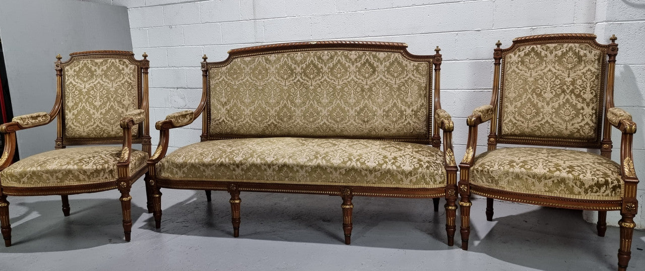 Beautiful French walnut Louis XVI style upholstered three piece Salon Suite. It has lovely fabric which is in overall good condition and is very comfortable to sit in. In good original detailed condition.