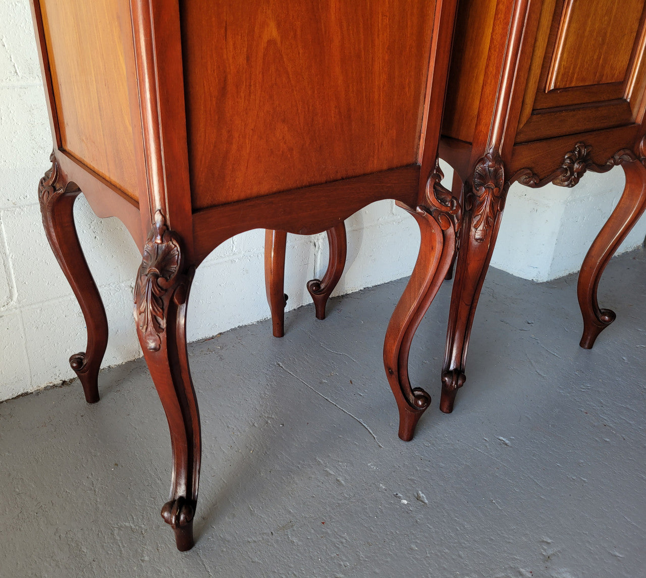 Pair of Louis XV style Walnut bedside cabinets marble top. Circa 1900 and in good original detailed condition.