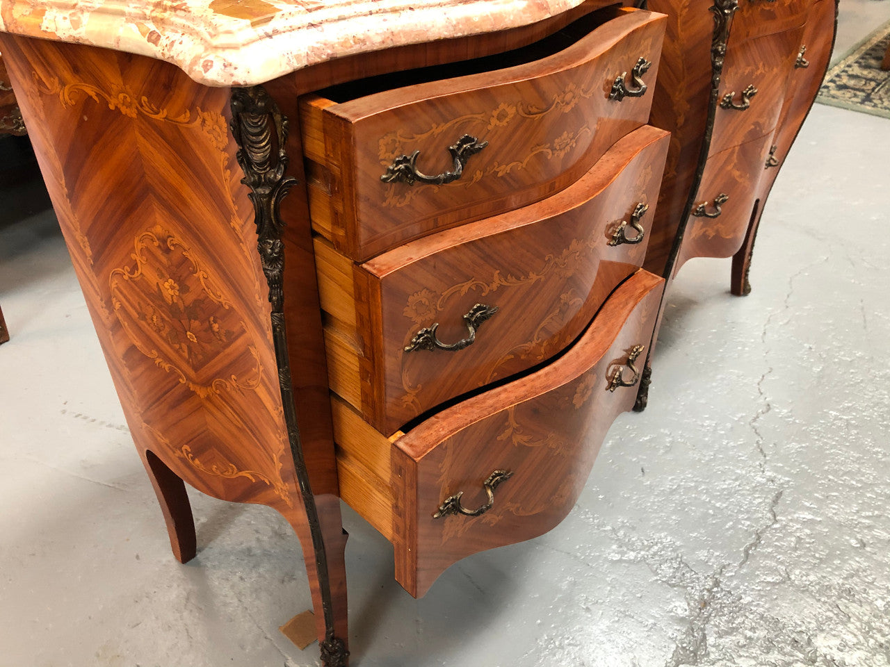 Rare Pair of French miniature commode bedsides with beautiful marquetry inlay & ormolu mount. Circa 1950's and are in very good condition.