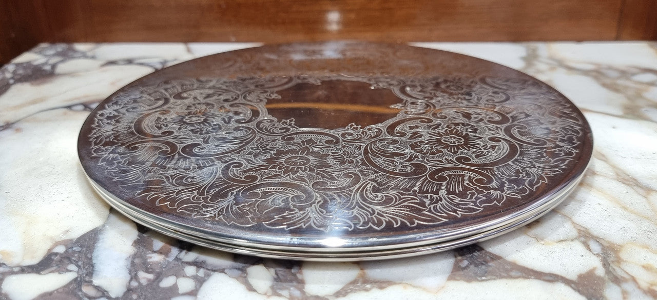 Two Strachan 30cm Silver Plate center table coasters. In good original condition.