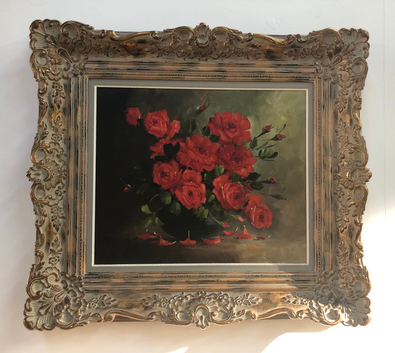 Lovely French oil on canvas of red roses in a beautiful ornate frame. In good original detailed condition.