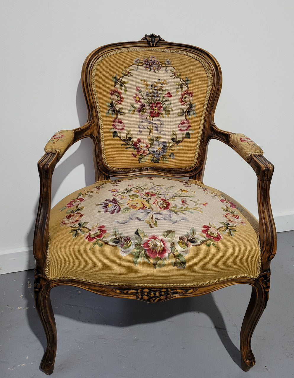 Louis XV style Walnut and tapestry armchair. Very comfortable to sit in and tapestry is in good original used condition.