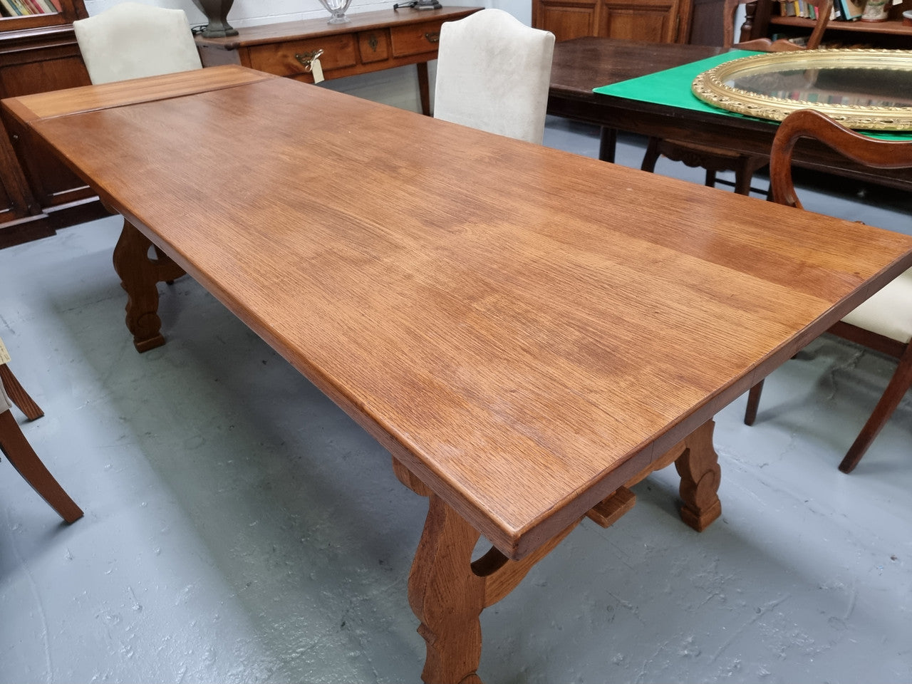 French light Oak Spanish style extension table. In good restored condition.