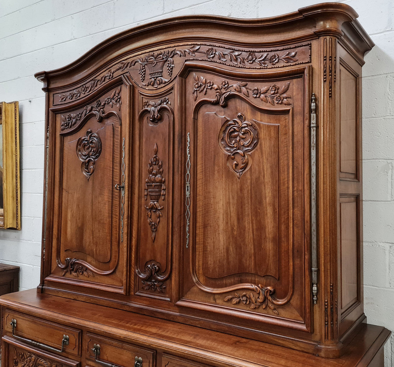 Beautiful 19th century Walnut Louis XV style sideboard with plenty of storage space. The top has two doors that open up to three adjustable shelves. It is in good original detailed condition.