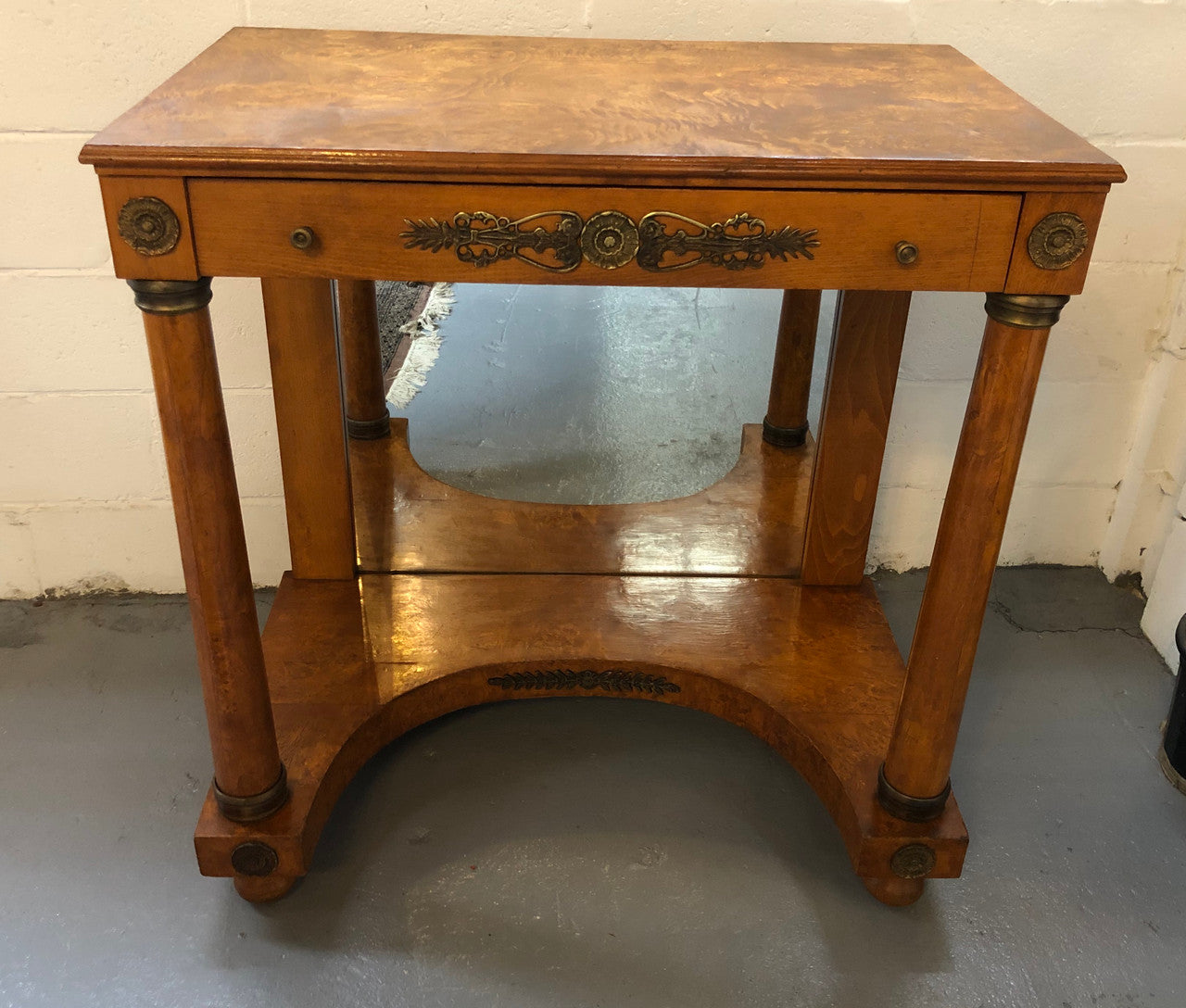 Art Deco Empire Style Console/Desk. It has a mirror underneath and a dawer. It could be used as a console table or as a small desk. In good restored condition.