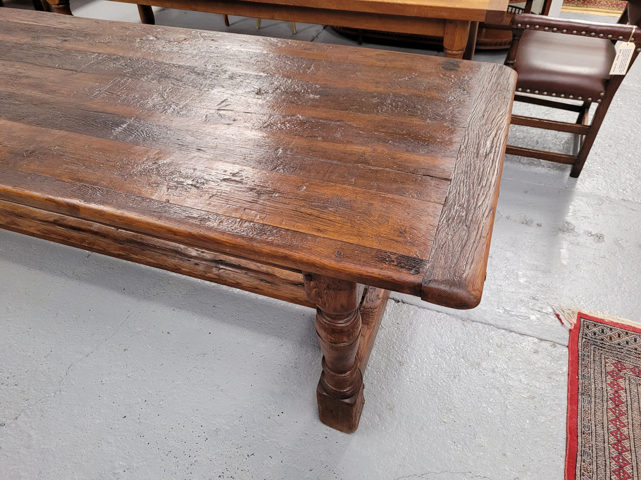 Amazing 2.65 meter French Elm Refectory dining table with loads of rustic charm. This table has been sourced from France and can comfortably seat ten people. It is in good original detailed condition.