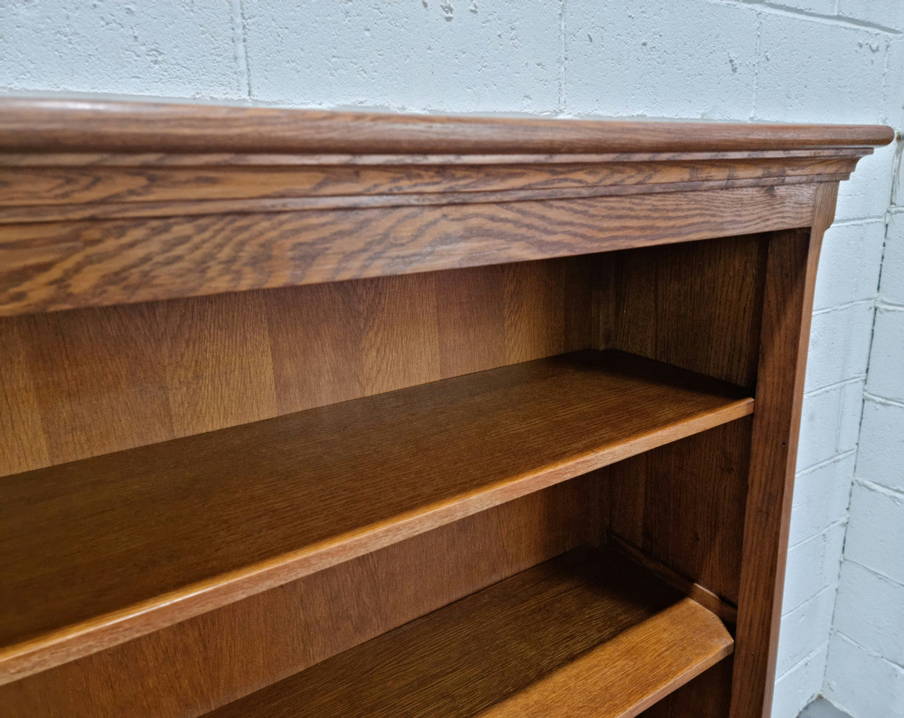 Lovely French Oak Louis XV style open shelf bookcase with two drawers for storage and three shelves in good original detailed condition.