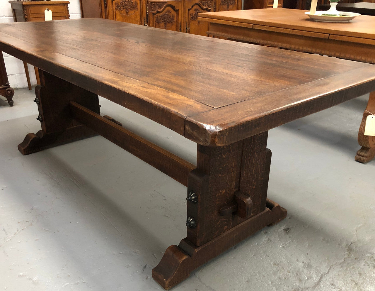 French Oak stretcher base Farmhouse dining table. In good original detailed condition.