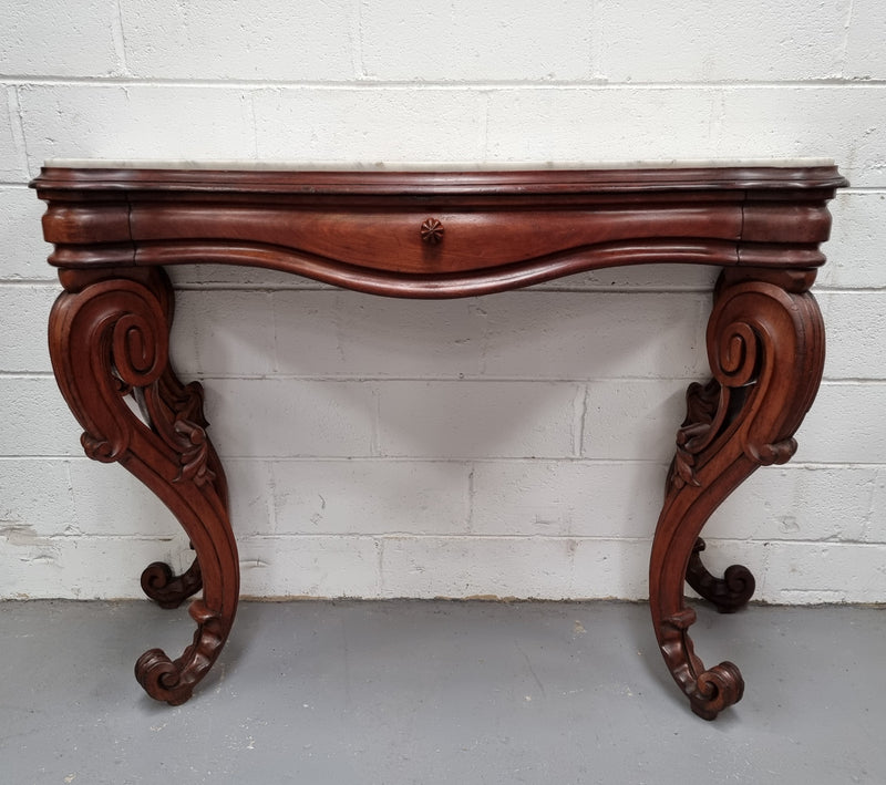 19th Century French Mahogany marble top console table. Louis XV style with white marble top and single drawer. Sourced from France and in good original detailed condition.